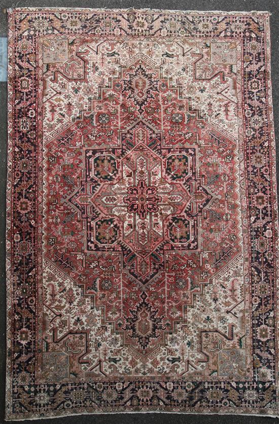 A Heriz carpet, 13ft 4in by 9ft 10in.